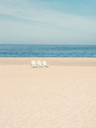 beach chairs on sandy beach