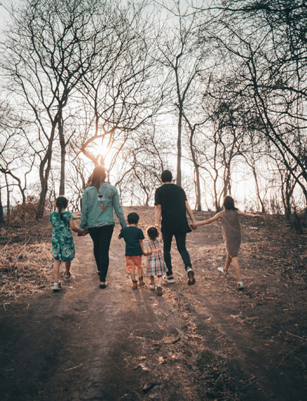family holding hands and walking family holding hands and walking